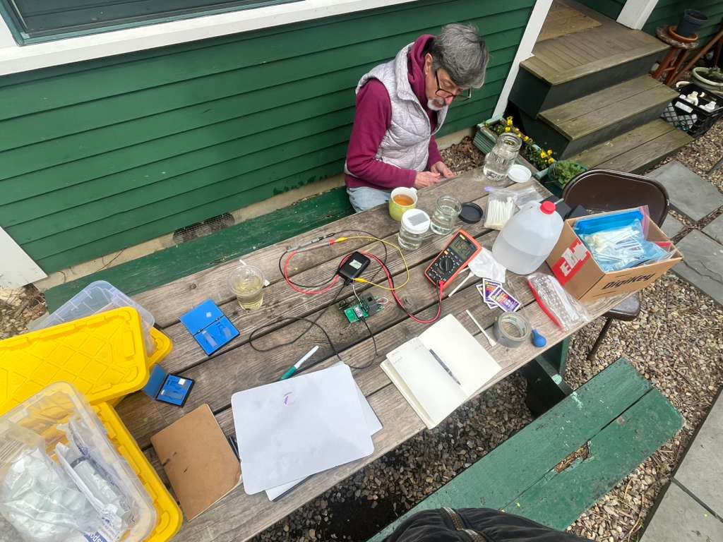 Mike at the picnic bench with the UV-254 setup