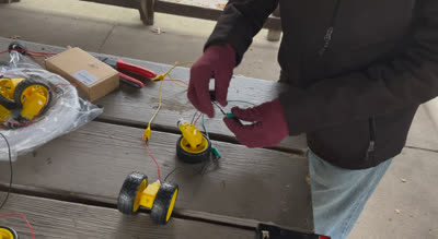 Mike and Greg testing solar panel performance on a cloudy day